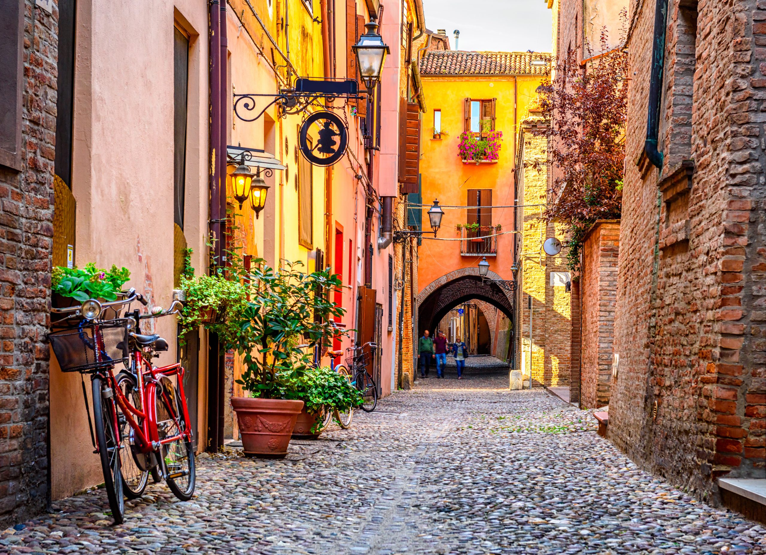 Cozy narrow street in Ferrara, Emilia-Romagna, Italy. Ferrara is